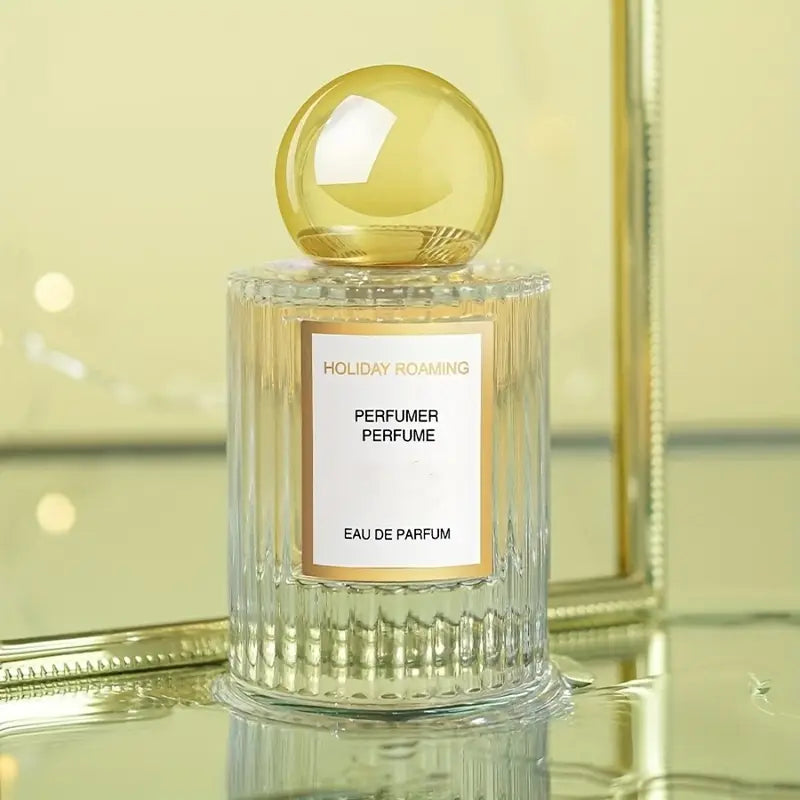 عطر نسائي - رائحة زهرية وفاكهية تدوم طويلاً، زجاجة ذهبية أنيقة