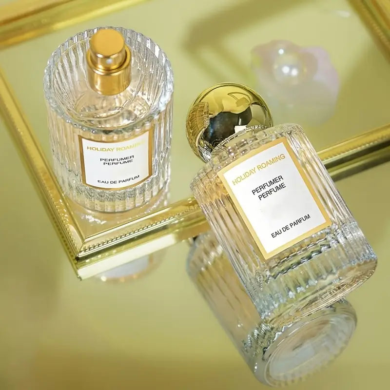 عطر نسائي - رائحة زهرية وفاكهية تدوم طويلاً، زجاجة ذهبية أنيقة