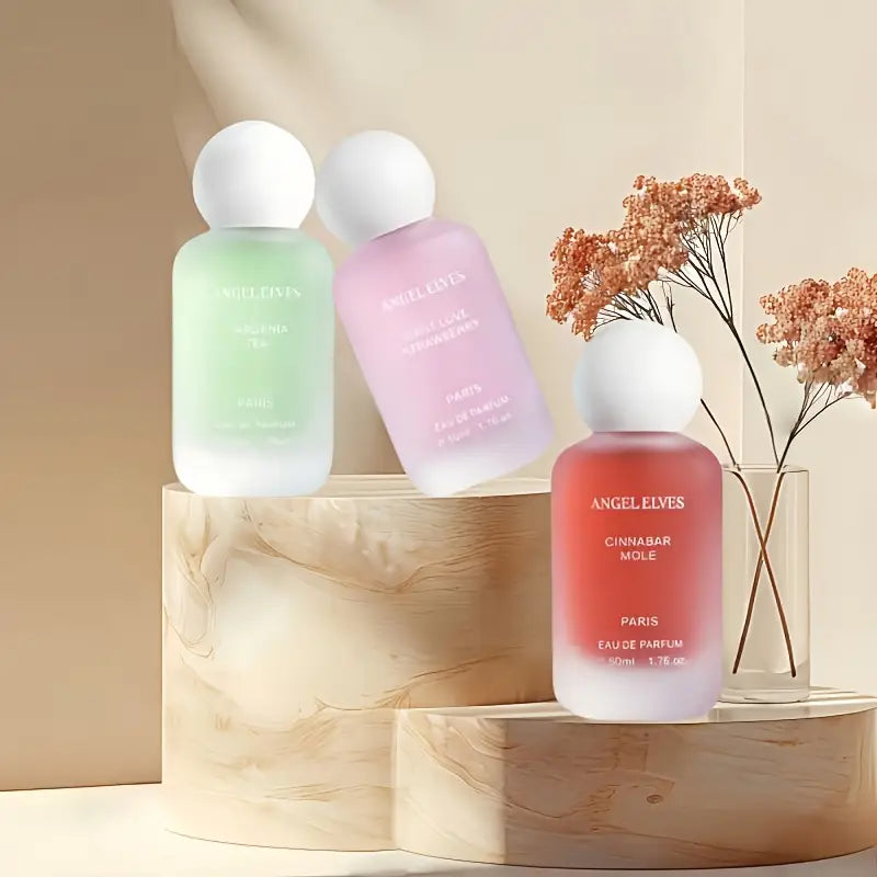 عطر نسائي خفيف زهري - عطر وردي يدوم طويلاً، زجاجة بيضاء أنيقة بتصميم زهور الباستيل، عطر صغير الحجم مناسب للسفر